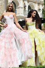 strapless lilac ball gown with beaded bodice - view: two girls front, detail: strapless, ruffled, tiered, high slit
