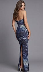 Back view of a strapless floor length gown with a center back slit and fitted silhouette