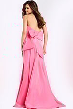 Satin prom dress with dramatic back bow detail