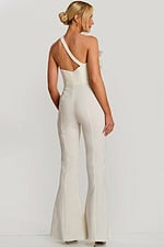 Side-back angle of fitted ivory jumpsuit with asymmetrical neckline and floral detail
