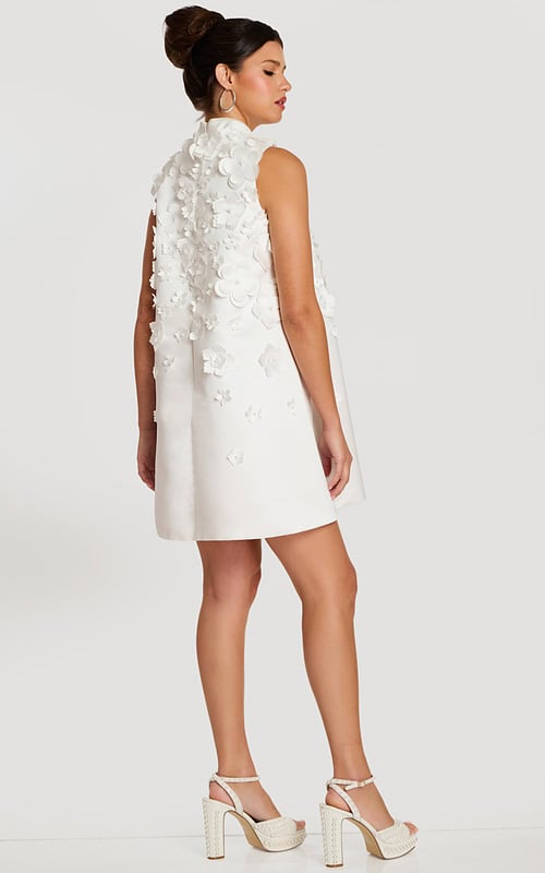 Three-quarter back view of 3D floral sleeveless dress with soft flare