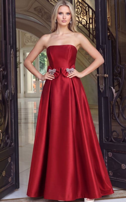 Red satin strapless ball gown with crystal bow accents at the waist, front view