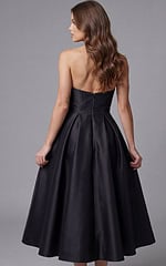Strapless black midi evening dress with structured bodice and crystal bow waist detail
