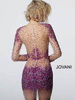 Model showing back of Jovani 47598 dress with fuchsia detailing.