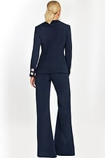 back view of Navy pantsuit with deep V-neck blazer, crystal square buttons, and embellished side bows.