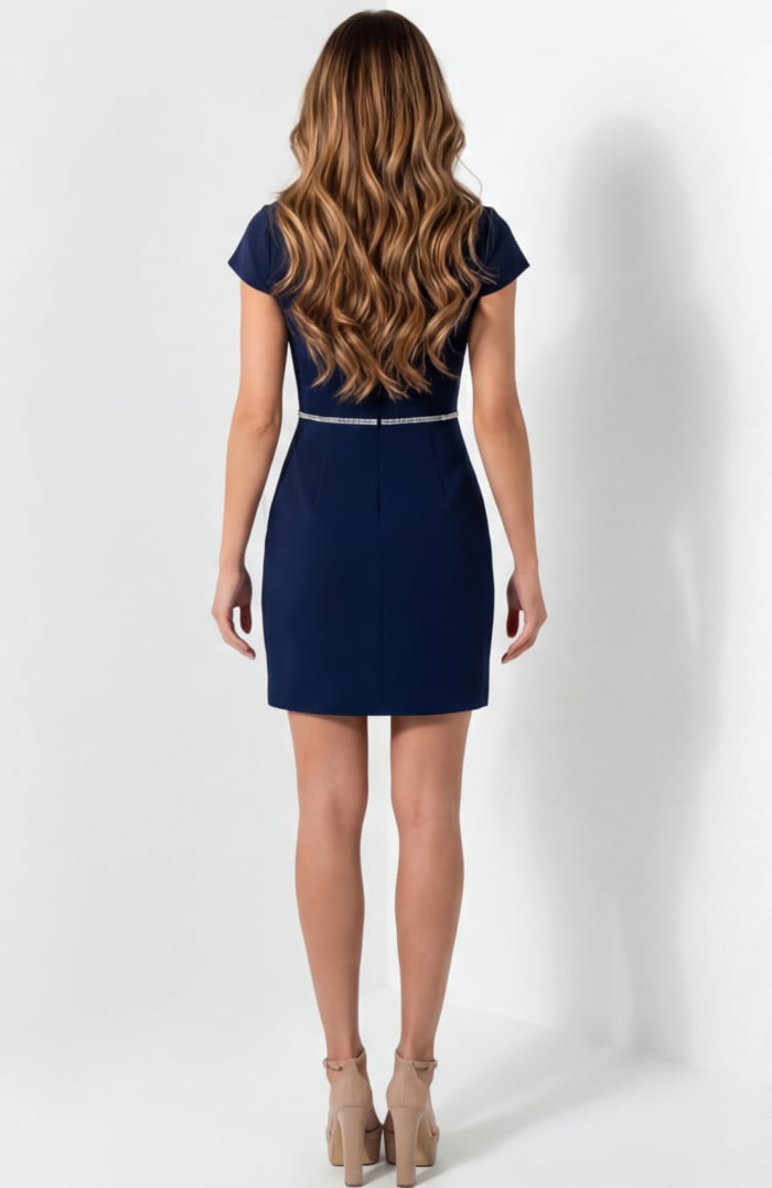 Back view of fitted dress with clean lines and structured shape