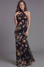 Formal halter gown with embroidered floral pattern and flowing skirt