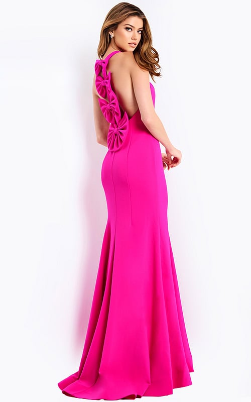 Elegant mermaid prom gown featuring open back with cascading bows