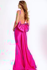 Elegant bow back gown with glitter finish and open back design