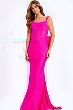 Pink fitted prom dress with draped bodice and large bow back detail