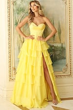 Strapless formal dress featuring cascading ruffle layers