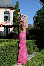 deep v purple sequin gown with side cutouts