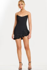 Strapless black mini dress with 3D rose details along the hem