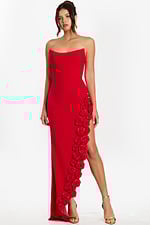 Front view of strapless red gown with floral applique trim along high slit