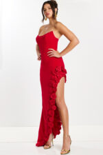 Three-quarter angle showing red floral gown with structured neckline and high slit