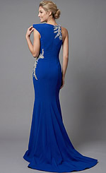 Back view of a sleek one shoulder gown with smooth silhouette and detailed crystal accents