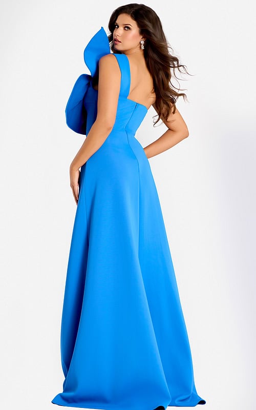 One shoulder blue gown featuring a dramatic oversized bow and flowing A-line skirt, designed for a modern and graceful appearance.