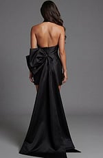 Halter neck mini dress with open back and oversized bow detail