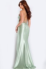 Light green fitted gown with lace-up back and ruched waist