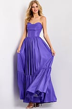 Floor length purple gown with dramatic tiered design