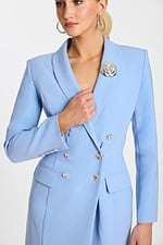 Light blue blazer-style midi dress with long sleeves, silver buttons, and floral brooch detail.