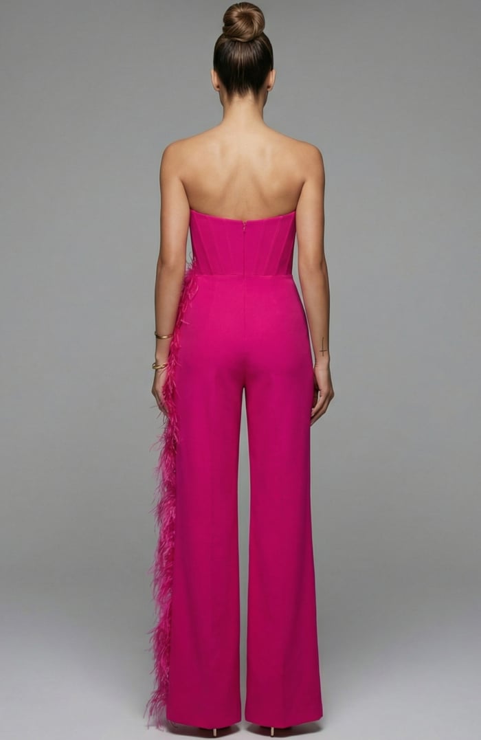 Back view of strapless jumpsuit with fitted corset bodice and clean finish