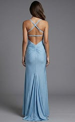 Back view of fitted evening gown with crisscross straps, open back, and softly ruched center detail