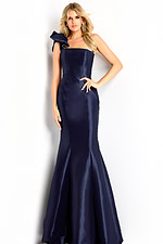 One-shoulder satin gown with structured ruffle detail and fitted mermaid silhouette.