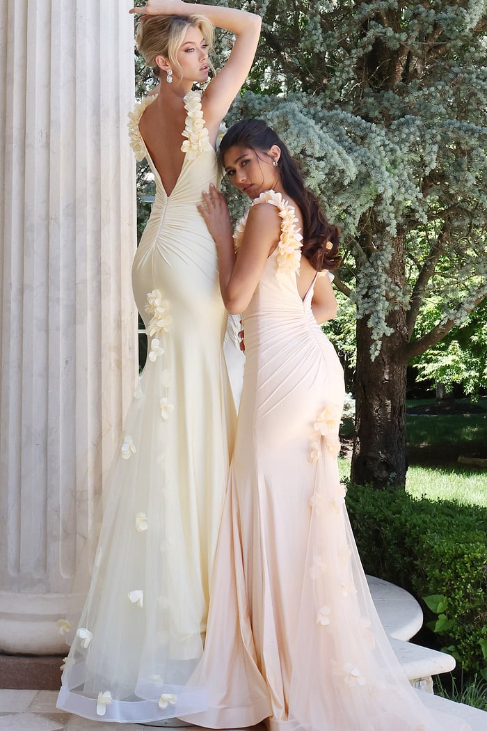 lilac mermaid gown with 3d floral shoulder - two girls front, updo, arm raised, side glance