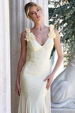 lightyellow lilac mermaid gown with 3d floral shoulder - front full body, leaning on pillar, direct gaze, stone lion