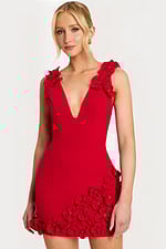 Elegant black cocktail dress with sculpted roses along hemline