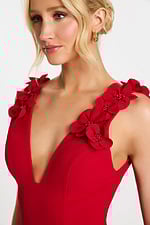 Fitted black short dress with sweetheart neckline and floral trim