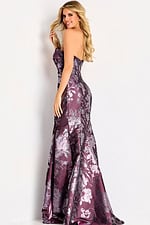 Strapless floral jacquard gown with a fitted mermaid silhouette and soft metallic sheen throughout the pattern.