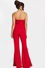 Back view of strapless red flared-leg jumpsuit with center zipper