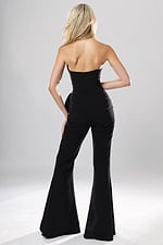 back view of black strapless jumpsuit with straight neckline, peplum rosette detail and wide leg pants, Jovani style 48209