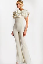 Side view of white jumpsuit showcasing sculptural ruffle detailing