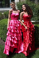 tiered satin dress with spaghetti straps - two girls front, blonde updo curly hair smiling