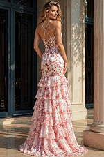 Back view of a floral print mermaid gown with lace-up open back and tiered ruffle skirt
