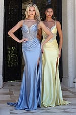 beaded corset dress with satin skirt - two girls front, blonde brunette serious ornate door