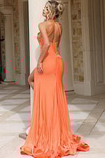 Elegant coral prom dress with backless design and side slit for formal events, galas, and red carpet occasions.
