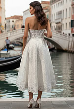 Back view of textured jacquard wedding dress with structured bodice