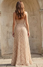 Back view of bridal gown with sheer fabric and intricate beadwork