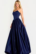 Strapless satin ball gown featuring a fitted bodice and full gathered skirt with elegant sheen.
