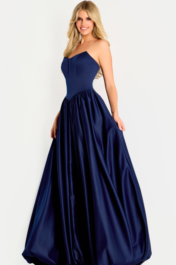 Strapless satin ball gown featuring a fitted bodice and full gathered skirt with elegant sheen.