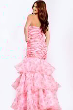 Back view of pink floral prom dress with layered train and fitted silhouette