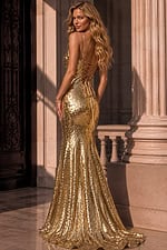 gold fitted evening dress with shimmering sequins, corset bodice, and floor-length train