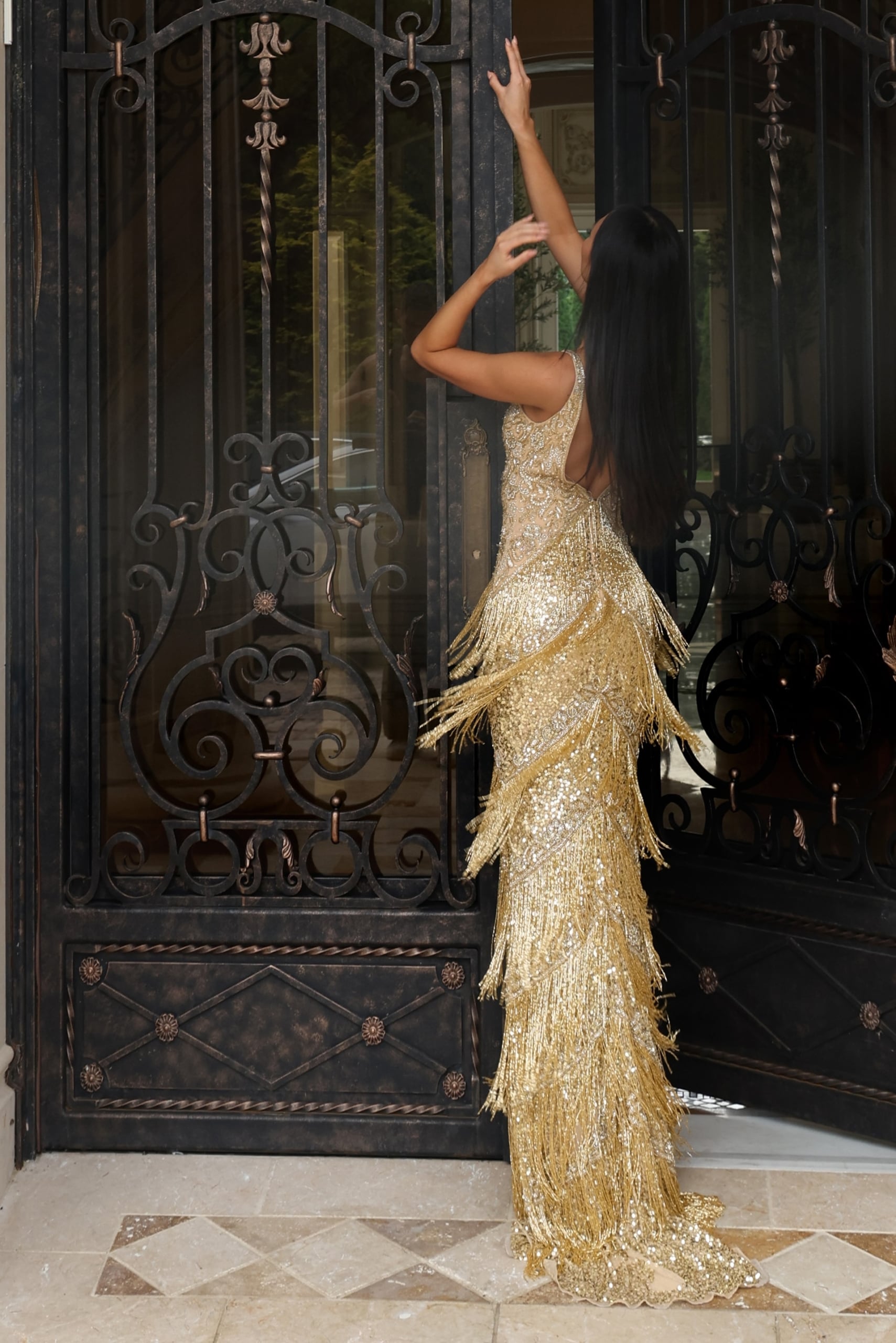 Gold beaded fringe prom dress with deep V neckline and high slit