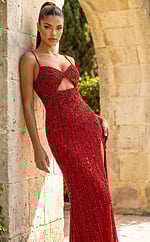 Front view of fitted embellished gown with cutout bodice, thin straps, and thigh high slit