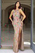 Front view of floral embellished gown with keyhole neckline and high slit