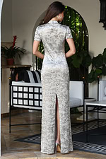 Jovani 48595 nude silver sequin fitted column gown back view with short sleeves, high collar neckline, zipper closure, and back slit